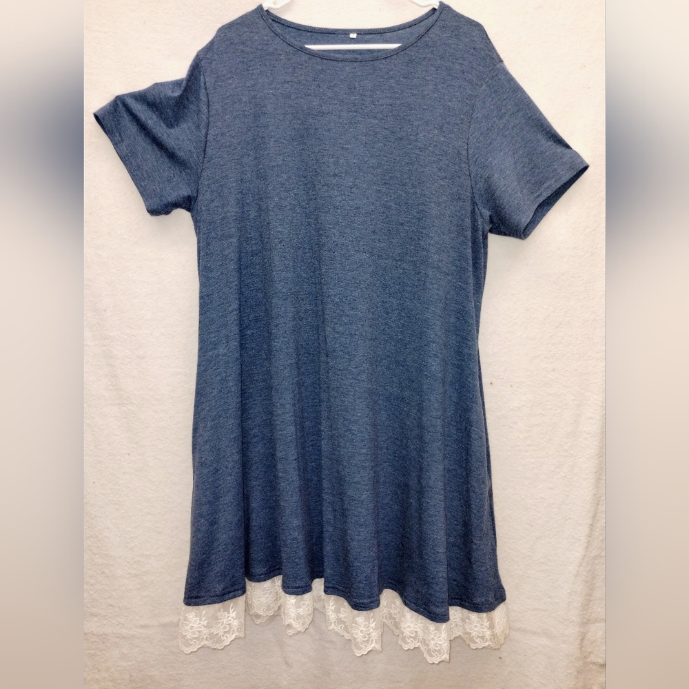 Blue tee-shirt dress. 4" deep white lace trim at hem. Size 2X.